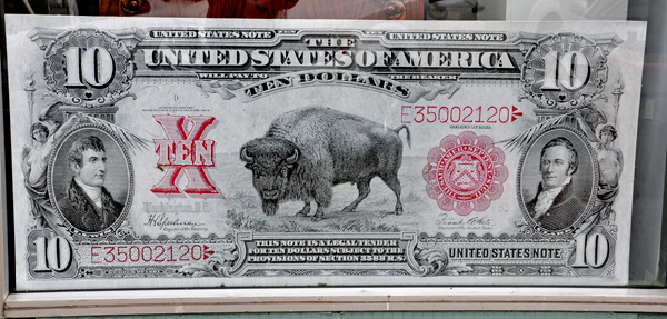 giant display of USA money from 1899 and 1901